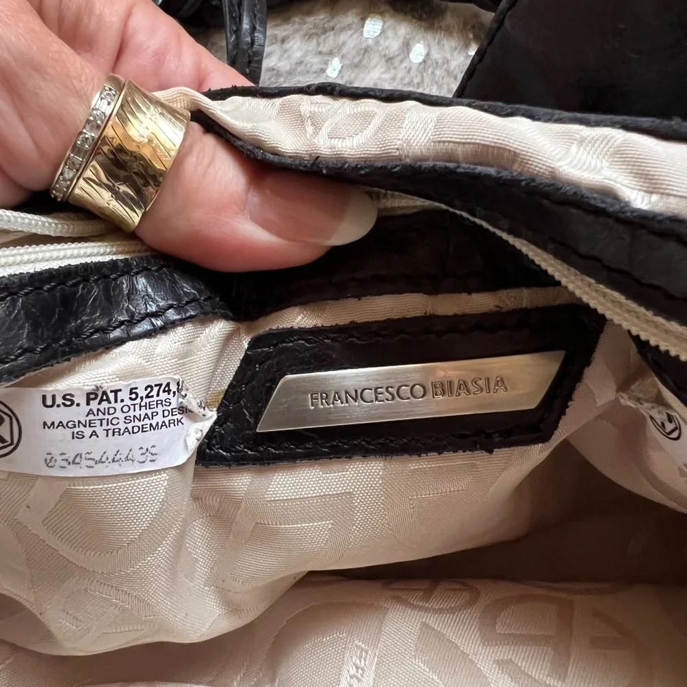 Francesco Biasia black leather bag.